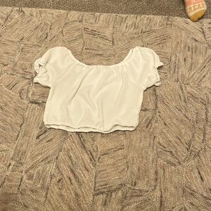 Cream cropped top with puffy sleeves